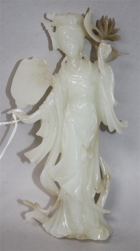 A Chinese white jade figure of an immortal